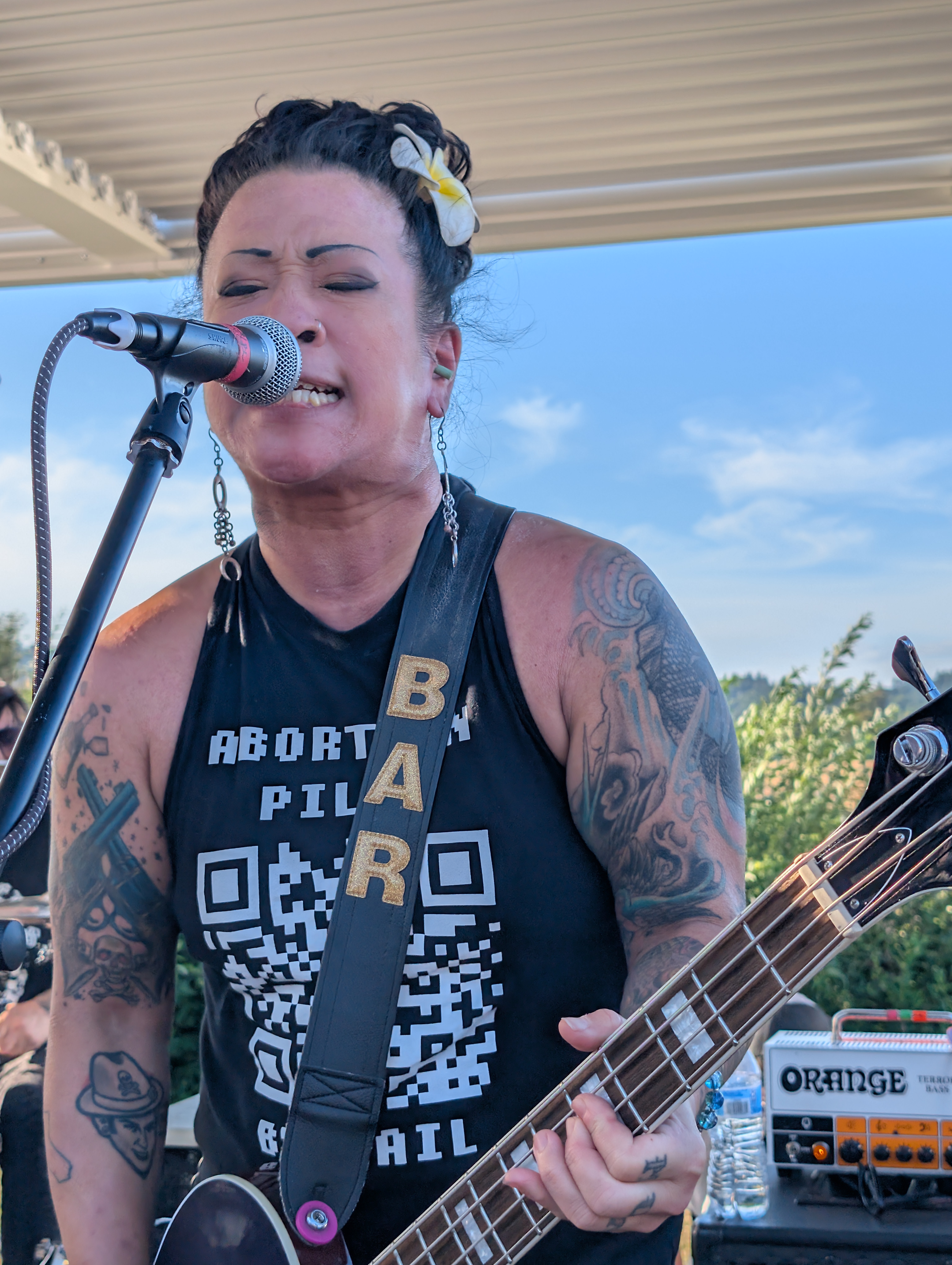 Linh Le from Bad Cop/Bad Cop sings and plays bass onstage